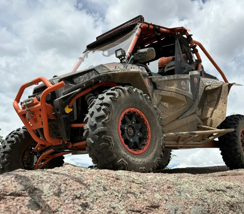 utv on a big rock